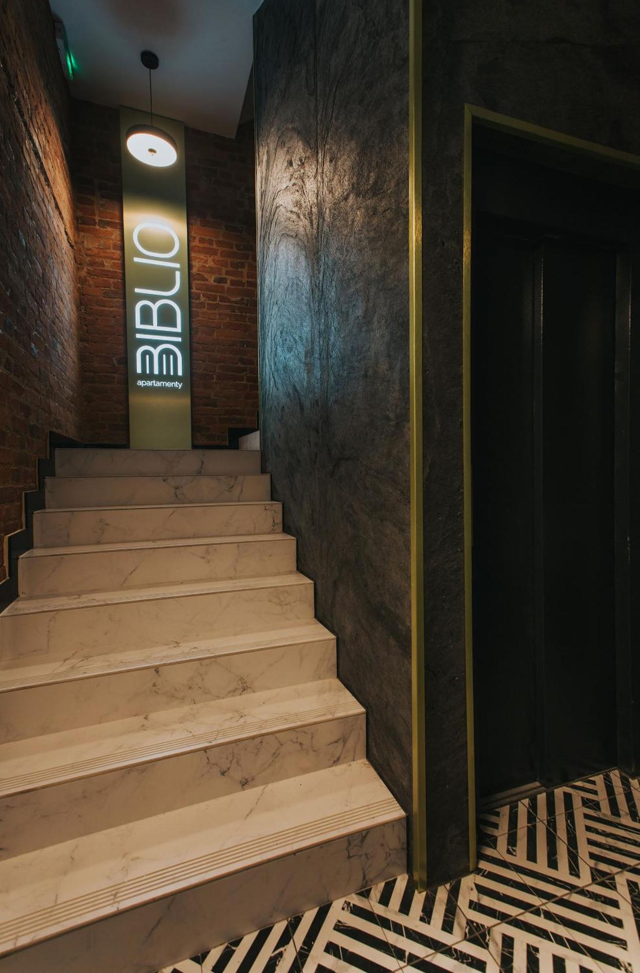 Apartamenty Biblio Lodź Bagian luar foto