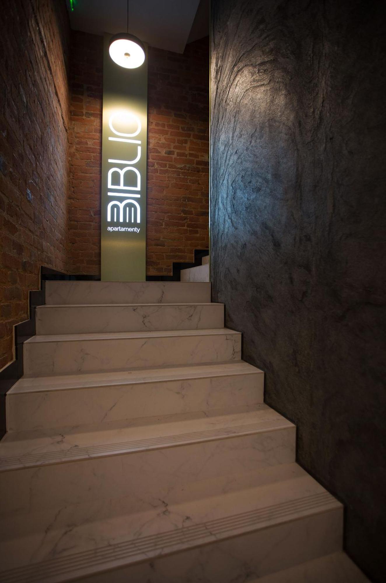 Apartamenty Biblio Lodź Bagian luar foto
