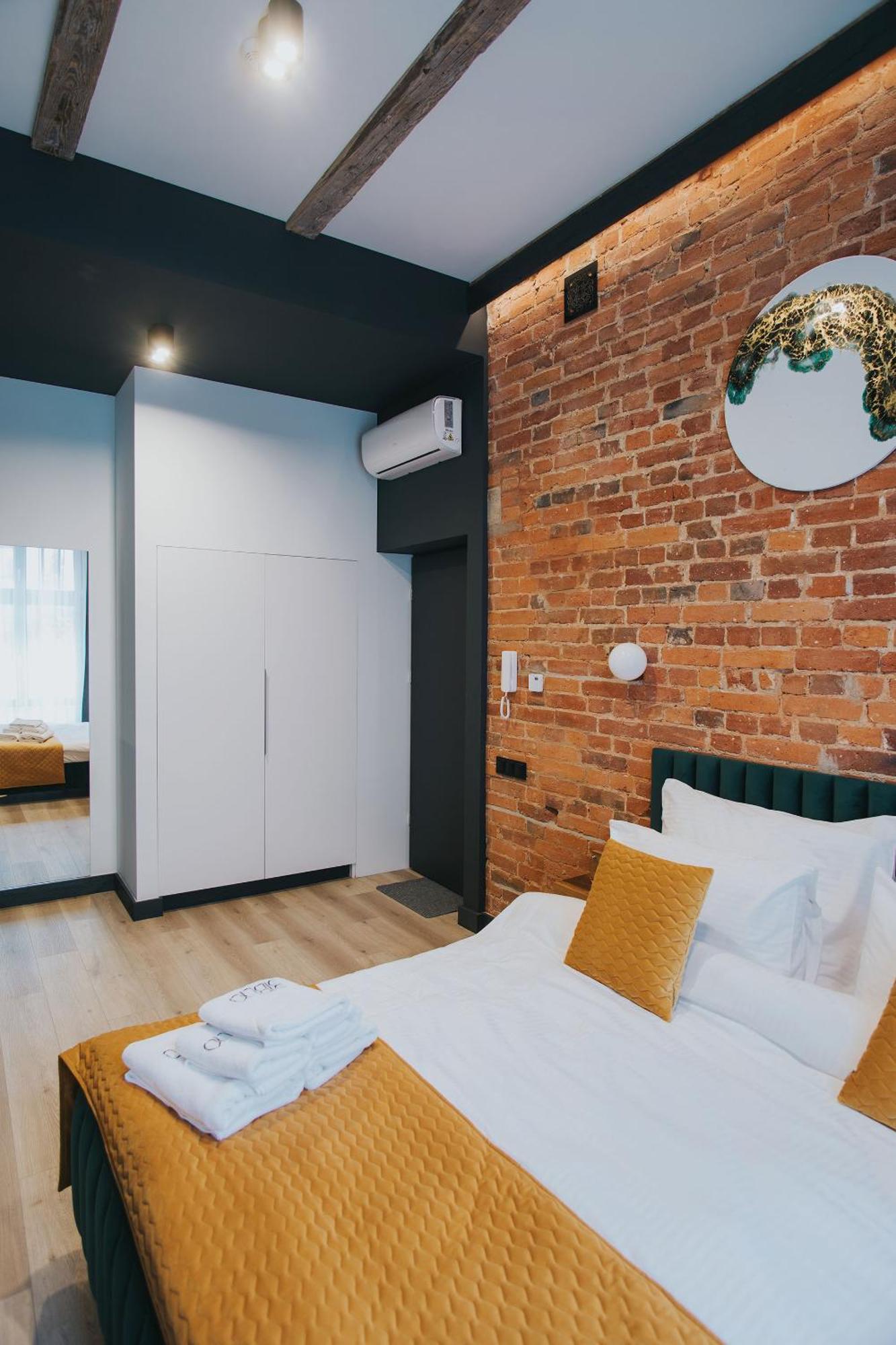 Apartamenty Biblio Lodź Bagian luar foto